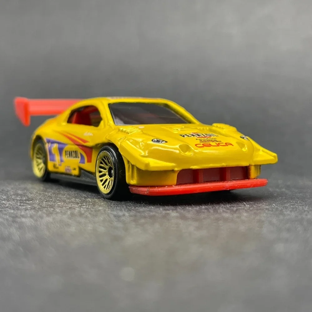 Hot Wheels Pennzoil #1 Toyota Pikes Peak Celica Race Car Yellow Diecast 1/64